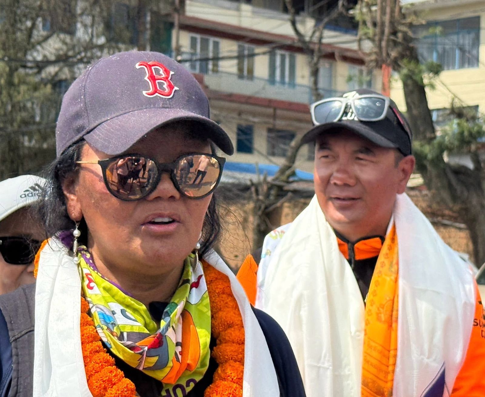 ‘Mountain Queen’ Lhakpa Sherpa returns to hero’s welcome after 11th Everest summit