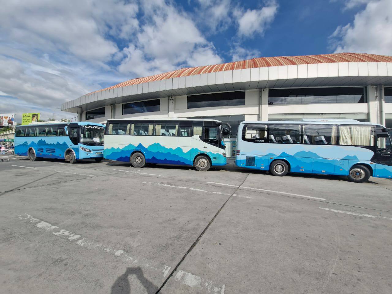 NTB provides shuttle buses for tourists traveling to and from TIA
